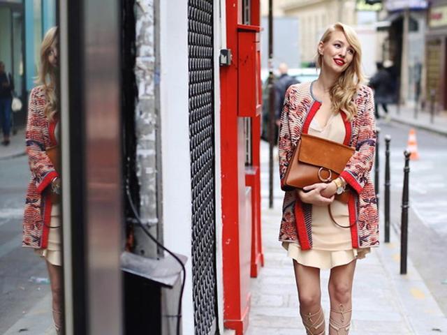 A long-cardigan that ends on your thighs is a great accessory to carry with a short dress. This is for those days when winter is just knocking on our doors and hasn’t completely set in. (AFP)