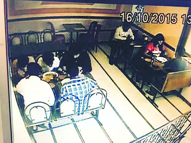 The CCTV footage showing the seven students in the eatery minutes before the incident.
