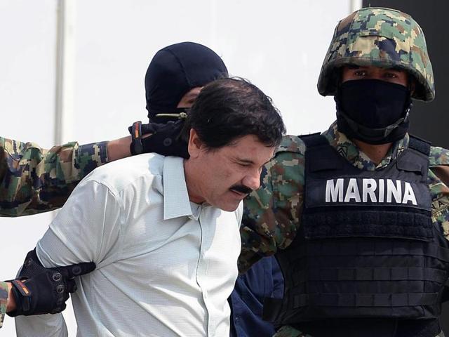 Mexican drug trafficker Joaquin “El Chapo” Guzman, seen here in the custody of Mexican marines. The Sinaloa cartel boss was injured during an unsuccessful attempt to recapture him. (AFP Photo) Mexican drug trafficker Joaquin “El Chapo” Guzman, seen here in the custody of Mexican marines. The Sinaloa cartel boss was injured during an unsuccessful attempt to recapture him. (AFP Photo)