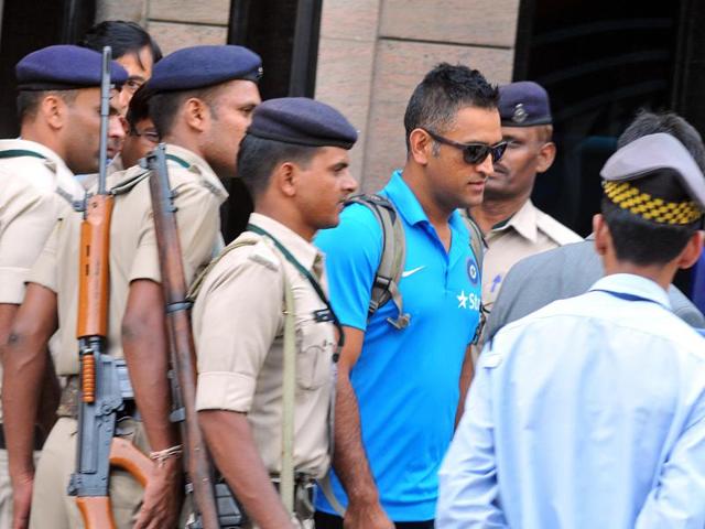 The Indian cricket team captain Mahendra Singh Dhoni departed for the team's next match in Rajkot. Police have tightened security due to the threat posed by the Patidar community.(HT Photo)