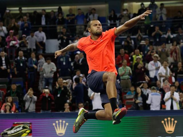 Jo-Wilfried Tsonga of France dives to return a shot against Rafael Nadal of Spain during their semifinal match of the Shanghai Masters tennis tournament in Shanghai, China. (AP Photo) (AP Photo) Jo-Wilfried Tsonga of France dives to return a shot against Rafael Nadal of Spain during their semifinal match of the Shanghai Masters tennis tournament in Shanghai, China. (AP Photo) (AP Photo)