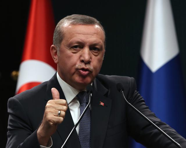 Turkish President Recep Tayyip Erdogan speaks to the media during a joint news conference with his Finnish counterpart Sauli Niinisto in Ankara, Turkey. The Turkish President has ridiculed the European Union’s attempts at solving the migrant crisis, making the tentative deal between the bloc and the country unlikely to materialise. (AP Photo)