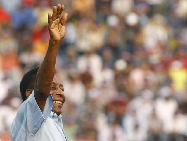 Legendary Brazilian soccer player Pele waves to the spectators before the start of under-17 boys' final match of Subroto Cup tournament at Ambedkar stadium, in New Delhi. (Sanjeev Verma/HT Photo)