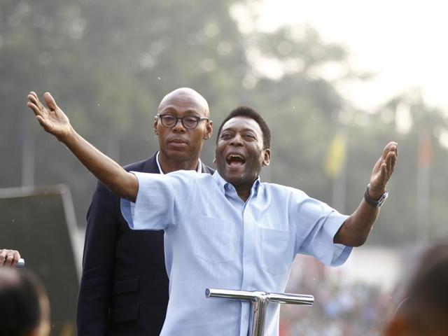 Brazilian soccer legend Pele is taken around the stadium in an open jeep while attending the final of the Subroto Cup Under-17 boys final in New Delhi on Friday. (Sanjeev Verma/HT Photo)