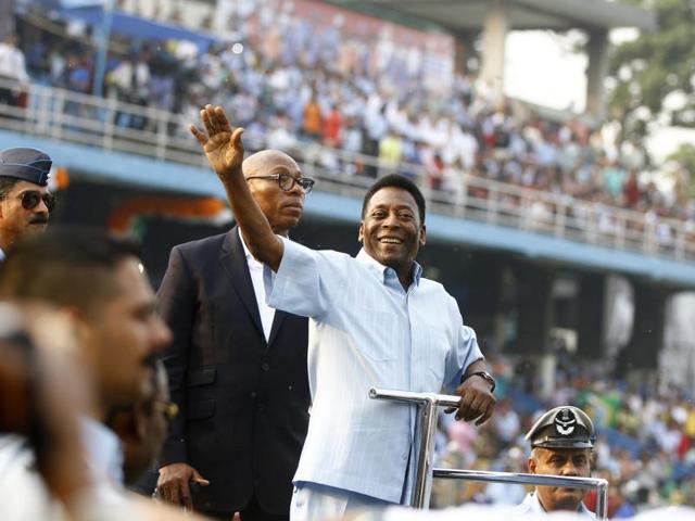 Pele is taken around the stadium in an open jeep while attending the Subroto Cup soccer for Under-17 boys final match, in New Delhi, India, on Friday. (Sanjeev Verma/HT Photo)