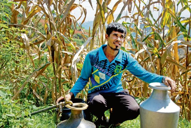 Maheshwar Parajuli says many of the water resources in Mathurapati village have dried up. In the past 10 years, only 20 of the original 60 sources have survived. As a result, villagers - mostly women - trudge long distances to fetch water. (Furquan Ameen Siddiqui/ HT Photo)