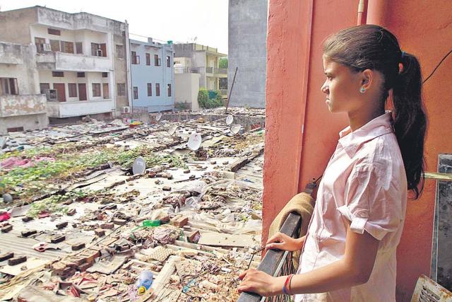 Varsha Kumari at her home in Gurgaon. The 13-year-old also has an IQ score of over 145, which puts her into the ‘genius’ category. (Sanjeev Verma/ HT Photo)