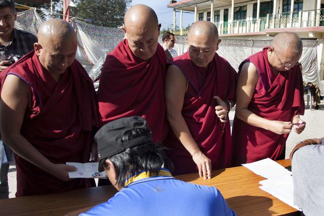 Tibetan Buddhist monks prepare to cast their vote in an election for the Parliament of the Tibetan government-in-exile at CTA complex in Dharamsala. (AFP) Tibetan Buddhist monks prepare to cast their vote in an election for the Parliament of the Tibetan government-in-exile at CTA complex in Dharamsala. (AFP)