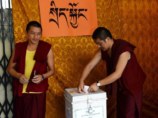 Tibetan monks cast their votes in an election for the Parliament of the Tibetan government-in-exile at a polling station in New Delhi. (AFP) Tibetan monks cast their votes in an election for the Parliament of the Tibetan government-in-exile at a polling station in New Delhi. (AFP)