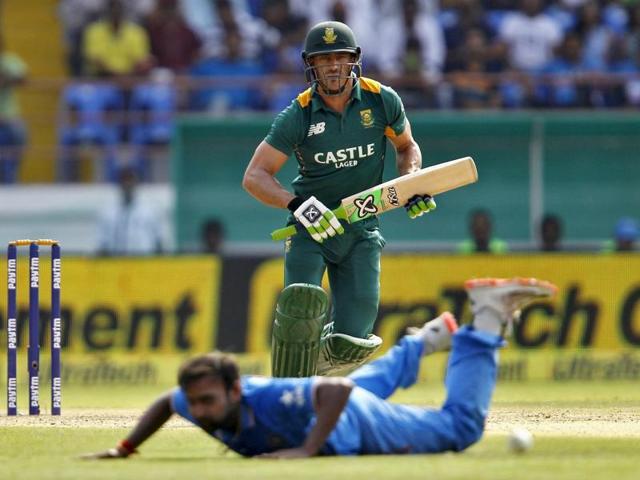 South Africa's Faf du Plessis watches the ball after playing a shot as India's Amit Mishra falls on the ground. (Reuters Photo) South Africa's Faf du Plessis watches the ball after playing a shot as India's Amit Mishra falls on the ground. (Reuters Photo)