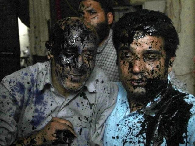 Jammu and Kashmir MLA Engineer Rashid (left) after an ink attack in New Delhi. (Arun Sharma/HT Photo) Jammu and Kashmir MLA Engineer Rashid (left) after an ink attack in New Delhi. (Arun Sharma/HT Photo)