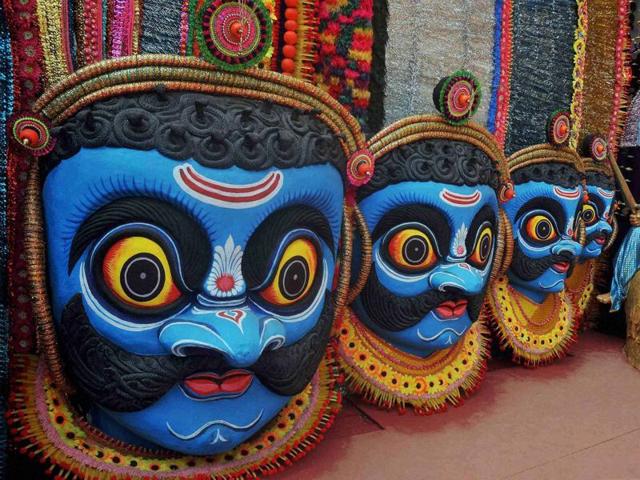A Durga Pujo pandal made on the theme of traditional 'Chhau Art' at Ajayo Sanhati in South Kolkata. (PTI)