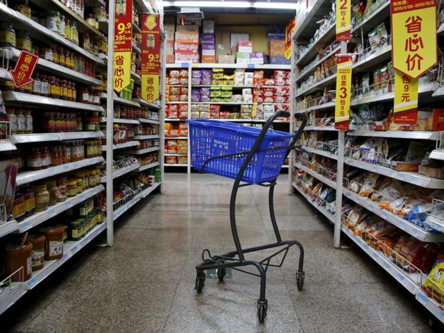 An empty shopping cart is seen at a branch store of Wal-Mart.(REUTERS)