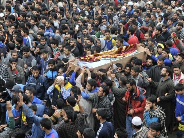 Kashmiri villagers carry the coffin of Zahid Ahmed during the funeral procession at his home at Batangoo village on Monday. (Waseem Andrabi/HT Photo) Kashmiri villagers carry the coffin of Zahid Ahmed during the funeral procession at his home at Batangoo village on Monday. (Waseem Andrabi/HT Photo)