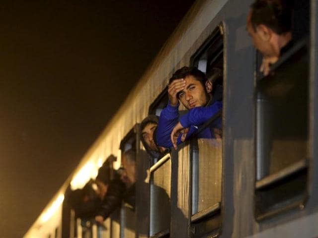 Migrants wait to exit a train at a station in Slovenia. (REUTERS) Migrants wait to exit a train at a station in Slovenia. (REUTERS)