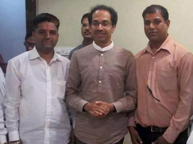 Shiv Sena chief Uddhav Thackeray meeting with Sena activists who had thrown ink on ORF chairman Sudheendra Kulkarni in Mumbai on Tuesday. (PTI Photo) Shiv Sena chief Uddhav Thackeray meeting with Sena activists who had thrown ink on ORF chairman Sudheendra Kulkarni in Mumbai on Tuesday. (PTI Photo)