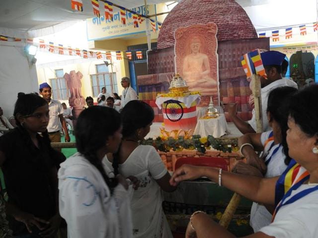 Devotees throng to have a glimpse of Buddha relics kept for Karuna Buddha Vihar in Bhopal on Monday. (Praveen Bajpai/HT photo) Devotees throng to have a glimpse of Buddha relics kept for Karuna Buddha Vihar in Bhopal on Monday. (Praveen Bajpai/HT photo)