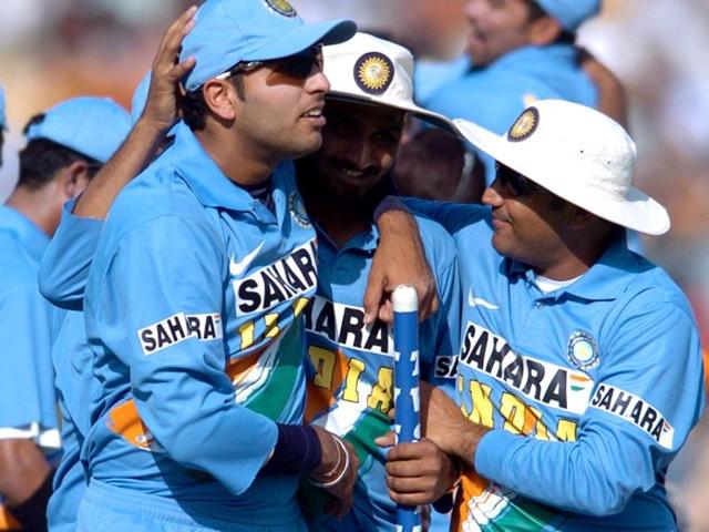 Yuvraj Singh (L), Harbhajan Singh (C) and Virender Sehwag (R) celebrate thier victory over England in the first One-Day International cricket match between India and England in New Delhi, 28 March 2006. (AFP)