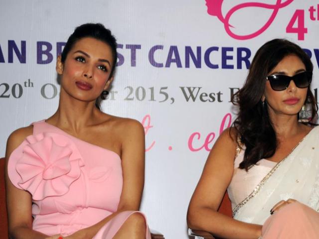 Bollywood actors Malaika Arora Khan and Canadian model and Bollywood actress Lisa Ray attend a press conference for supporting the Women’s Cancer Initiative in Mumbai on October 19, 2015. (AFP)