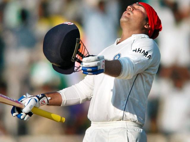 Sehwag looks to the heavens after completing his triple century on the third day of the first Test against South Africa, in Chennai in 2008. (PTI Photo)