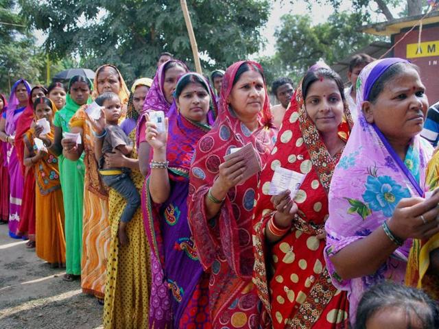 Voters wait in queue to cast their vote during the second phase of Bihar Assembly elections at Gaya on Friday. (PTI Photo) Voters wait in queue to cast their vote during the second phase of Bihar Assembly elections at Gaya on Friday. (PTI Photo)