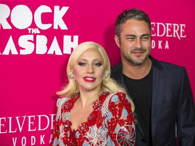 Singer Lady Gaga arrives with Taylor Kinney for the premiere of the film Rock the Kasbah in New York. (REUTERS)