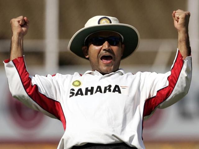 Sehwag exults after taking a catch during a practice session a day before the third Test match against Sri Lanka in Ahmadabad, in December 2005. (AP)