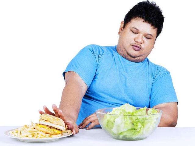 The rules aim to limit marketing and sale of unhealthy snacks, such as burgers and pizzas, within 50 metres of a school, in line with similar curbs on tobacco products already in place.(Shutterstock)