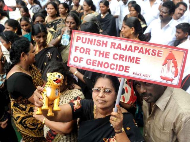 People from Tamil Nandu and activists from the MDMK party hold placards and a toy tiger during a protest against Sri Lankan President Mahinda Rajapaksa. Allegations that the Sri Lankan army committed war crimes during the bloody conflict with Tamil rebels are “credible”, a government probe panel has said (File Photo) People from Tamil Nandu and activists from the MDMK party hold placards and a toy tiger during a protest against Sri Lankan President Mahinda Rajapaksa. Allegations that the Sri Lankan army committed war crimes during the bloody conflict with Tamil rebels are “credible”, a government probe panel has said (File Photo)