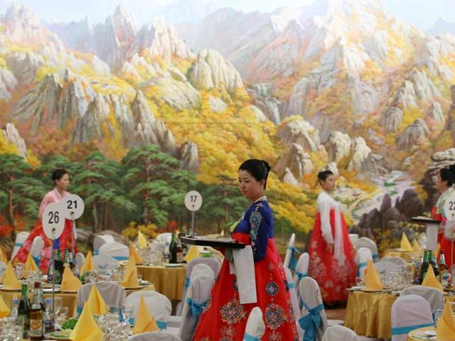 North Korean women prepare for a group luncheon during the separated family reunions at Mount Kumgang resort, North Korea. (Reuters Photo)