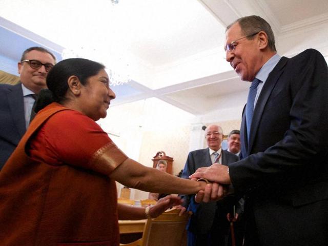Russian Foreign Minister Sergey Lavrov, right, and India's External Affairs Minister Sushma Swaraj shake hands during their meeting in Moscow, Russia(AP Photo)