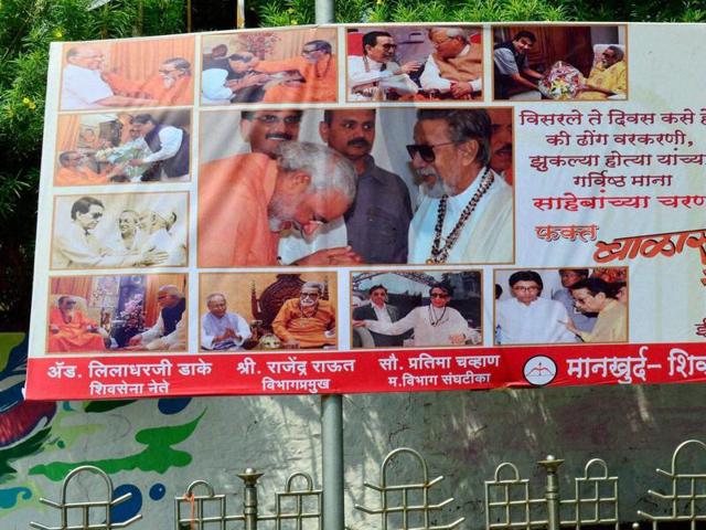 A poster put up by the Shiv Sena in Mumbai. The poster has come under fire from the Congress as it depicts Narendra Modi and Pranab Mukherjee bowing before late Shiv Sena leader, Bal Thackeray(PTI Photo) A poster put up by the Shiv Sena in Mumbai. The poster has come under fire from the Congress as it depicts Narendra Modi and Pranab Mukherjee bowing before late Shiv Sena leader, Bal Thackeray(PTI Photo)