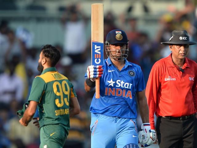 India’s Suresh Raina celebrates after scoring a half-century. (AFP Photo)
