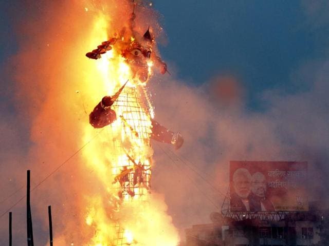 A burning effigy of Ravana during Dussehra celebrations at Gandhi Maidan in Patna on Thursday. (Arvind Yadav/ Hindustan Times)