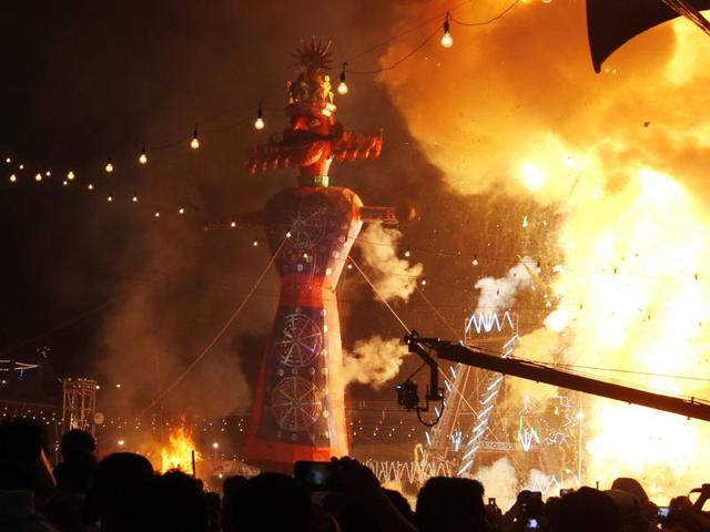 The effigy of demon king Ravana goes up in flames during the Dussehra festival at the Lav Kush Ramlila Committee in New Delhi on Thursday. (Ajay Aggarwal/ Hindustan Times)