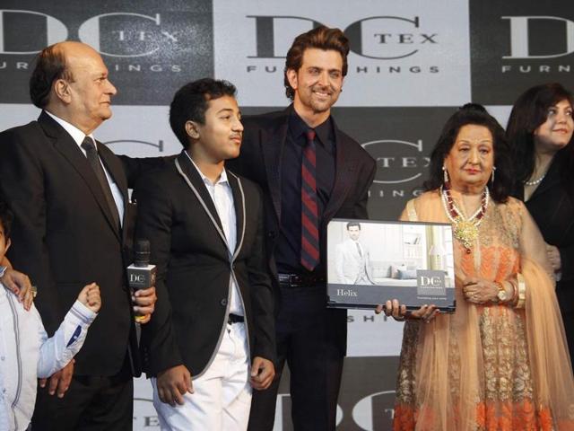 Okay, I’l pose for just this one time ONLY for the kid. Hrithik Roshan during the launch of Dctex new furnish collection 'dream runner' in Mumbai on Oct 21, 2015. (IANS)