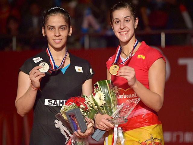 Saina Nehwal conceded her World No. 1 ranking to Spain’s Carolina Marin, right. (AFP Photo) Saina Nehwal conceded her World No. 1 ranking to Spain’s Carolina Marin, right. (AFP Photo)