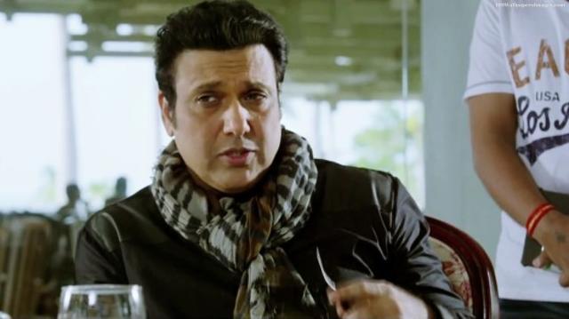 Govinda in a still from Happy Ending. (YOUTUBE GRAB) Govinda in a still from Happy Ending. (YOUTUBE GRAB)