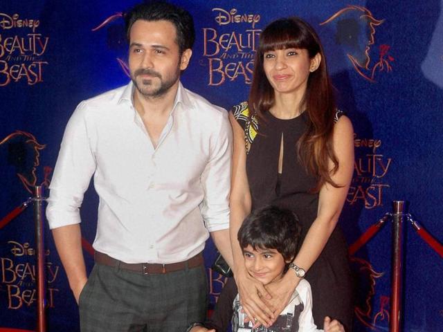 Emraan Hashmi with wife and son during Disney India's Beauty and the Beast event in Mumbai on Wednesday evening. (PTI)