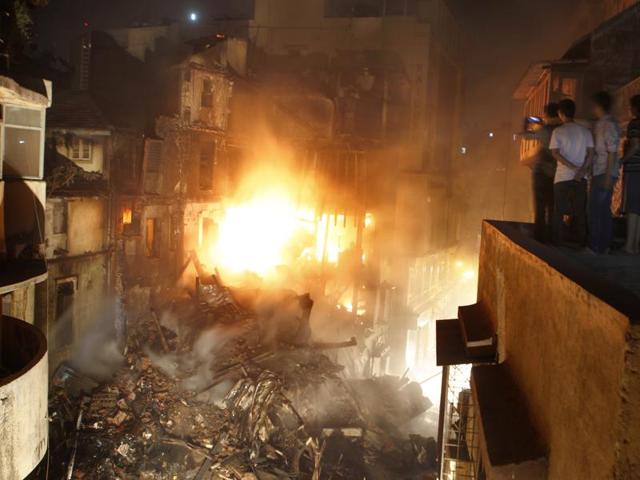Gokul Nivas building at Kalbadevi, where a massive fire killed four senior fire officials in May, did not have any firefighting equipment. Its wooden staircase and inflammable materials stored there aggravated the fire. (HT file photo) Gokul Nivas building at Kalbadevi, where a massive fire killed four senior fire officials in May, did not have any firefighting equipment. Its wooden staircase and inflammable materials stored there aggravated the fire. (HT file photo)