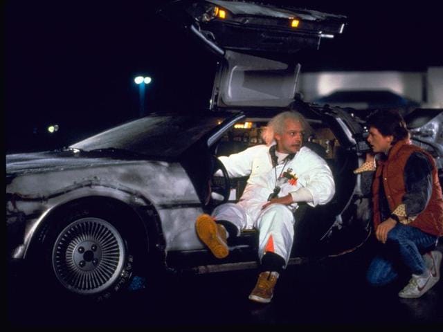 This file photo shows Christopher Lloyd, left, as Dr Emmett Brown, and Michael J Fox as Marty McFly in the 1985 film, Back to the Future. For one day, a picturesque town about 60 miles north of Los Angeles was transformed into Hill Valley, the fictional hometown of McFly from the Back to the Future franchise. (AP)