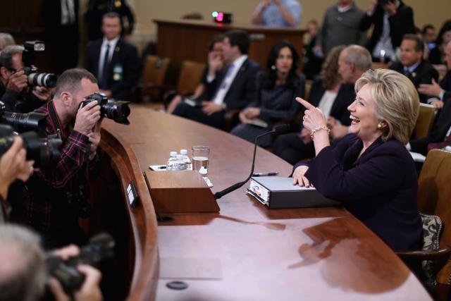 Hillary Clinton (R) prepares to testify before the House Select Committee on Benghazi . The committee held a hearing to continue its investigation on the attack that killed US ambassador Chris Stevens and three other Americans at theÊdiplomatic compound in Benghazi on September 11, 2012. (AFP) Hillary Clinton (R) prepares to testify before the House Select Committee on Benghazi . The committee held a hearing to continue its investigation on the attack that killed US ambassador Chris Stevens and three other Americans at theÊdiplomatic compound in Benghazi on September 11, 2012. (AFP)