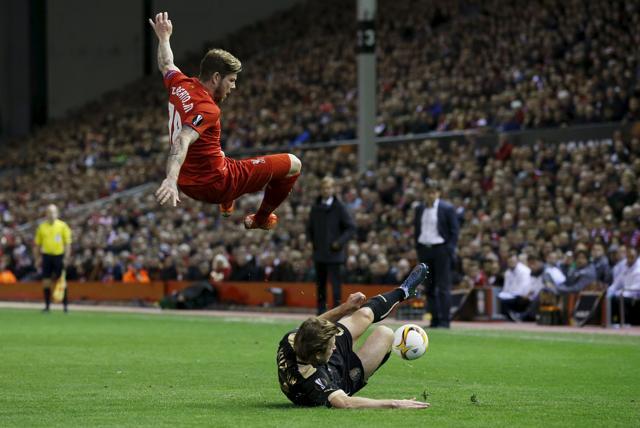Liverpool's Alberto Moreno in action against Rubin Kazan's Oleg Kuzmin. (Reuters Photo) Liverpool's Alberto Moreno in action against Rubin Kazan's Oleg Kuzmin. (Reuters Photo)