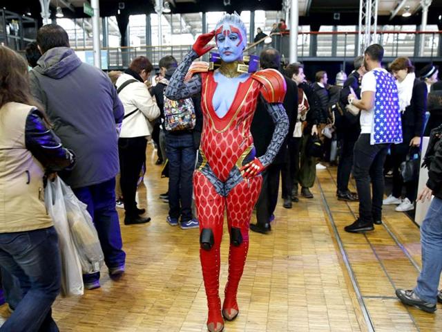 A woman dressed up as Samara, a character from the Mass Effect video game, takes part in the first Comic Con convention on October 23, 2015, in Paris. (AFP)