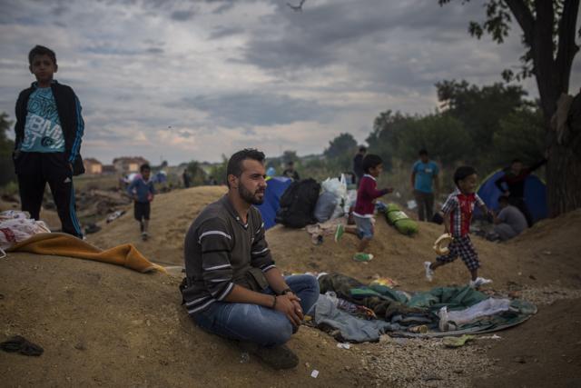 After crossing through Macedonia and into Serbia, Mohammed al-Haj ended up in another bottleneck-turned-madhouse, the town of Presevo. (AP Photo) After crossing through Macedonia and into Serbia, Mohammed al-Haj ended up in another bottleneck-turned-madhouse, the town of Presevo. (AP Photo)
