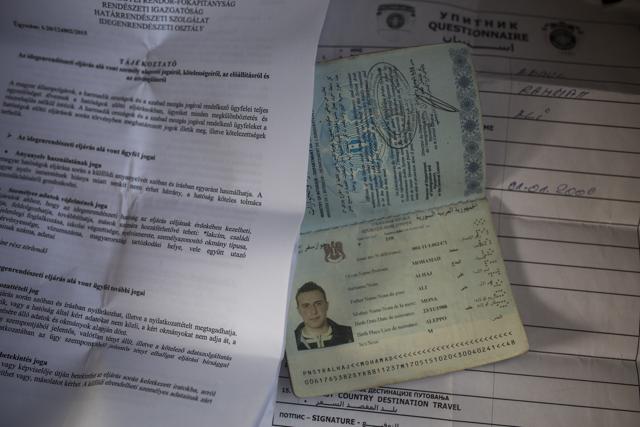 Mohammed al-Haj's passport and the papers he got from the Serbian and Hungarian authorities are displayed for a photograph in Linz, Austria. Mohammed, a 27-year-old from Aleppo, was one of more than 600,000 migrants and refugees who flowed into Europe so far this year. ) (AP Photo) Mohammed al-Haj's passport and the papers he got from the Serbian and Hungarian authorities are displayed for a photograph in Linz, Austria. Mohammed, a 27-year-old from Aleppo, was one of more than 600,000 migrants and refugees who flowed into Europe so far this year. ) (AP Photo)