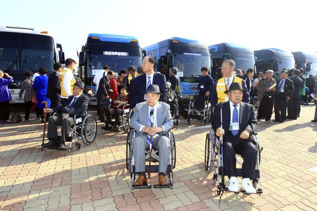 South Korean elderly people leave for North Korea to take part in family reunions with their North Korean family members at Inter Korean transit office in Goseong, South Korea, Saturday, Oct. 24, 2015. (AP Photo) South Korean elderly people leave for North Korea to take part in family reunions with their North Korean family members at Inter Korean transit office in Goseong, South Korea, Saturday, Oct. 24, 2015. (AP Photo)
