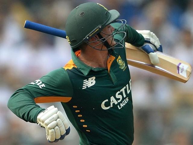 South Africa's Quinton de Kock punches the air in celebration after scoring a century. (AFP Photo)