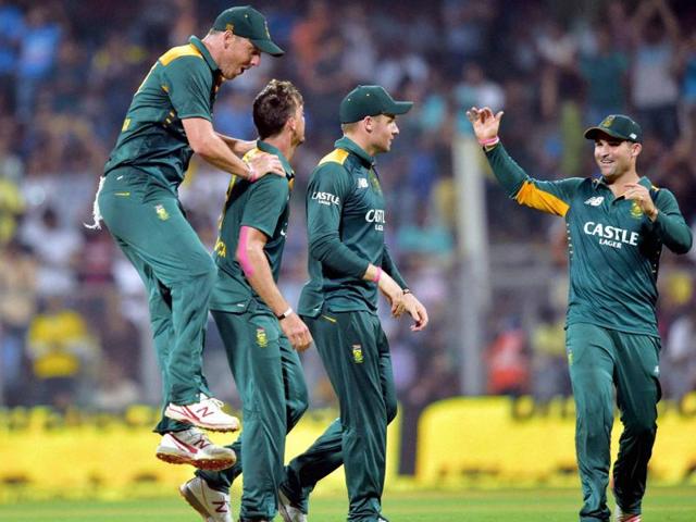 South African players come to congratulate Dale Steyn, second from left, on taking Ajinkya Rahane's wicket. (PTI Photo)