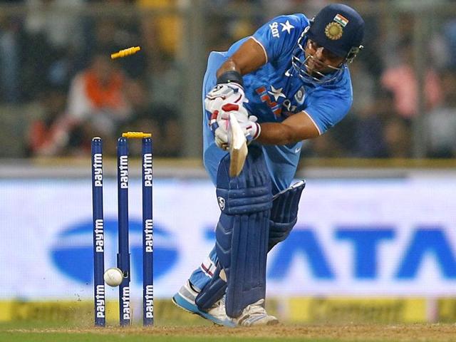 India's Suresh Raina is bowled behind his legs by South Africa's Kagiso Rabada. (Reuters Photo)
